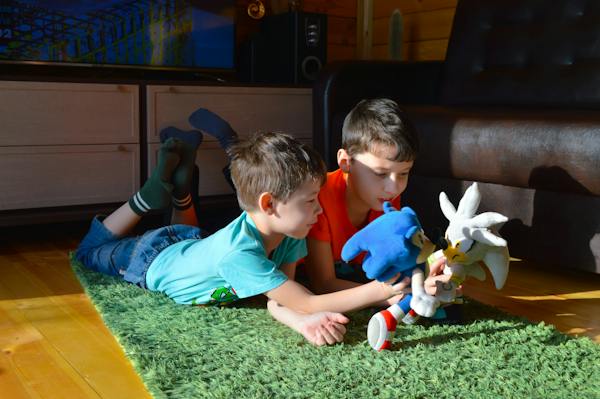 kids playing on fluffy rug